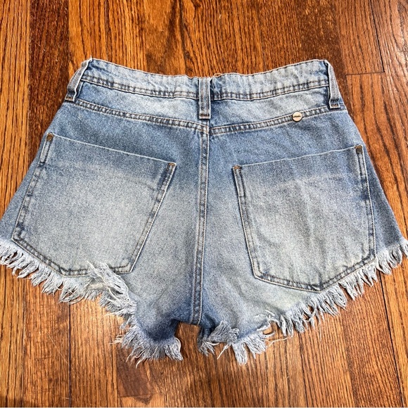 Ferando Brand Brazilian frayed hem denim shorts size 4 US. Side grommets EC - Picture 2 of 8
